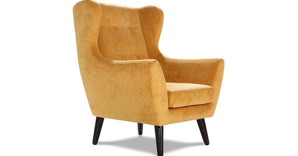 CLEO ozdobne pikowanie oparcia fotela podkreśla skandynawski styl kolekcji.